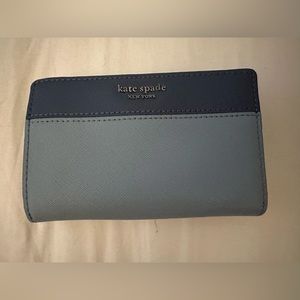 Blue Kate Spade Wallet.  Never used